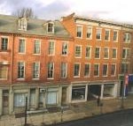 The Historic East Side Suites in the heart of downtown Lancaster will undergo a $9.2 million transformation into a mixed-use development with help from NDC's Michelle Mooney and New Markets Tax Credit financing.